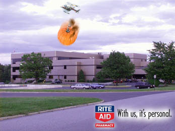 Helicopter dropping pumpkin on Rite Aid headquarters